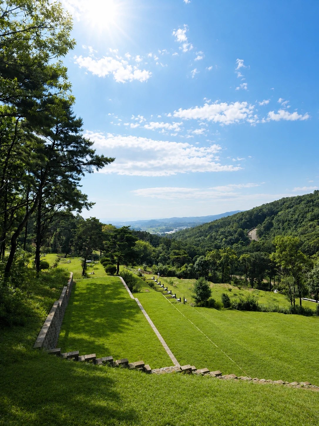 House of Hue grounds — terraced lawn under blue sky